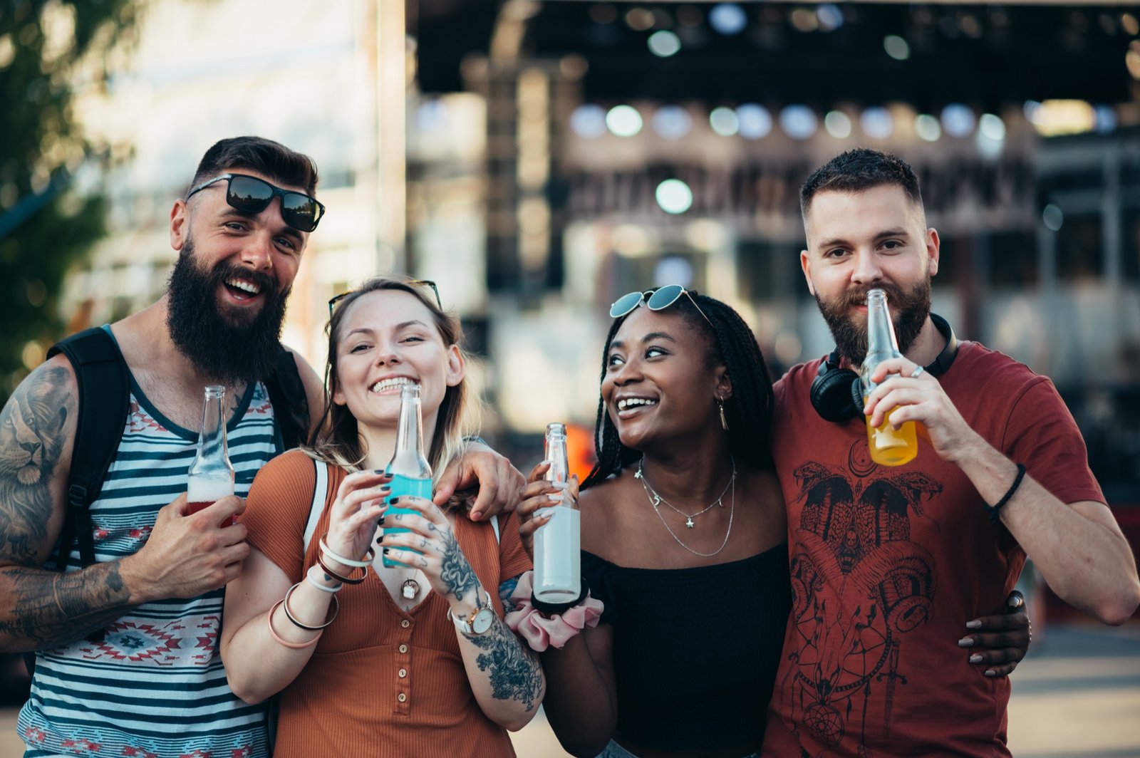 Friends enjoying refreshments together at an outdoor event