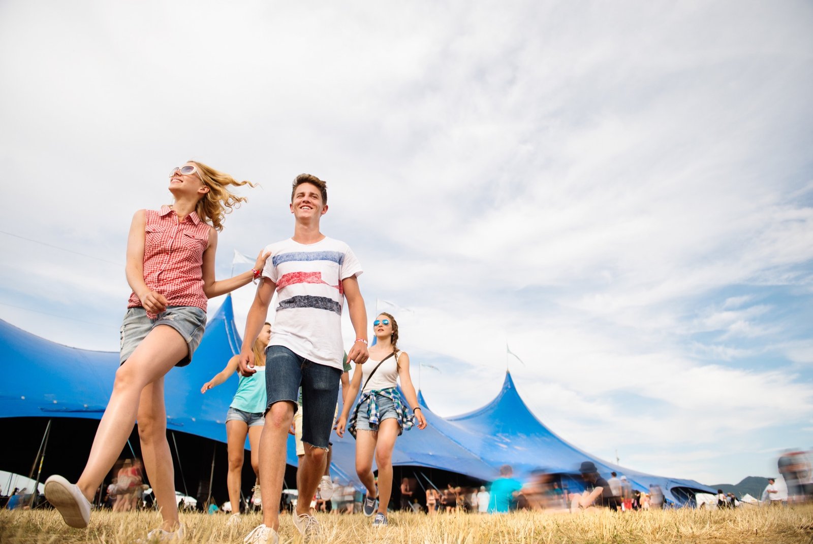 Friends arriving together at an outdoor festival